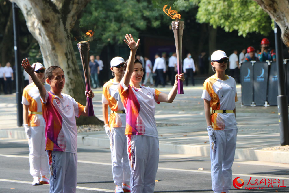 杭州亞運會火炬傳遞現場。人民網記者 郭揚攝