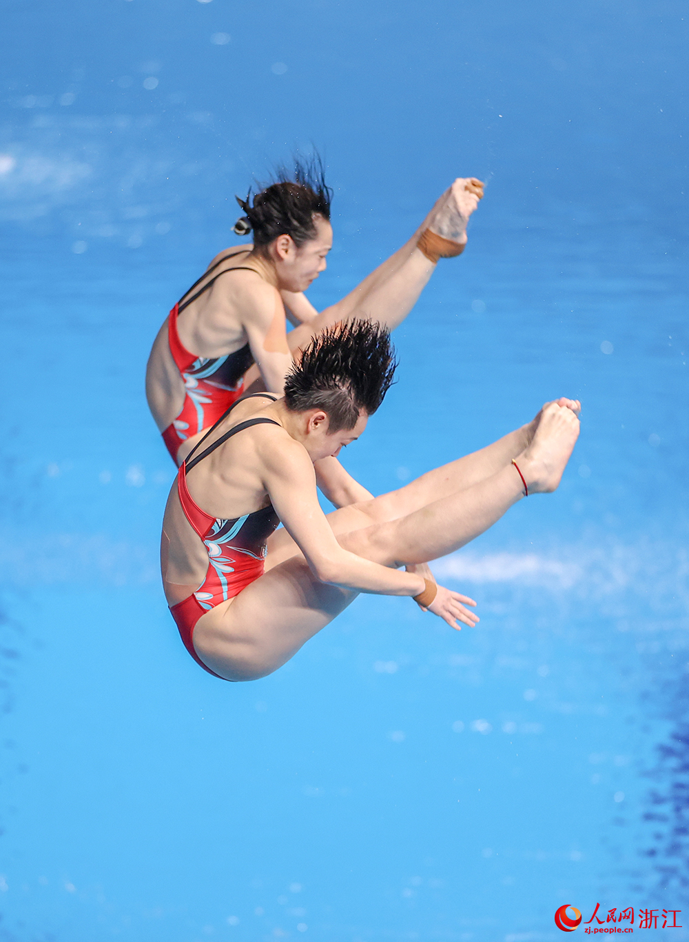 10月1日，中国组合陈艺文/昌雅妮在比赛中。人民网 章勇涛摄