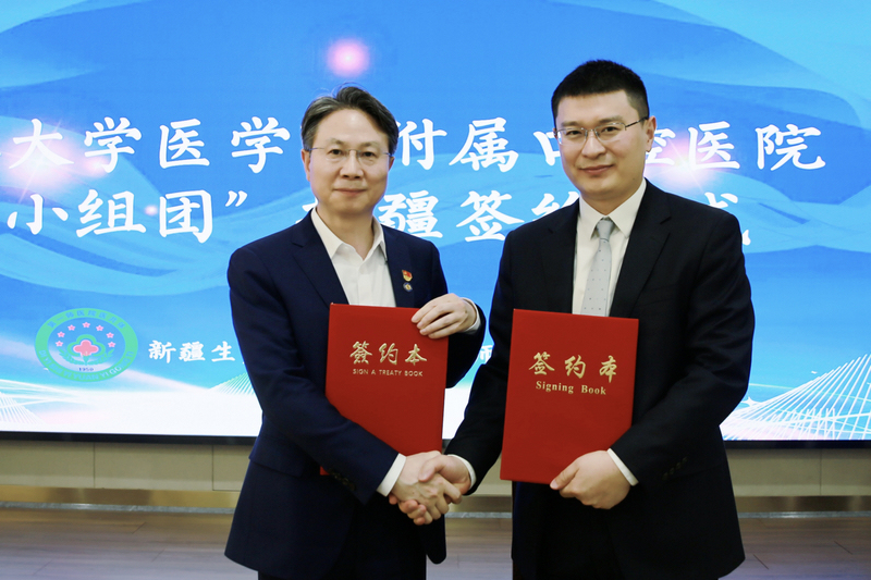 段胜仲带队调研新疆生产建设兵团第一师医院，签署“小组团”援疆合作协议。浙大口腔供图