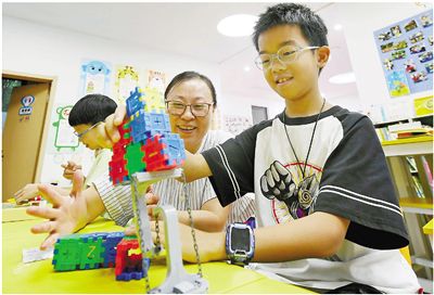 李忠摄